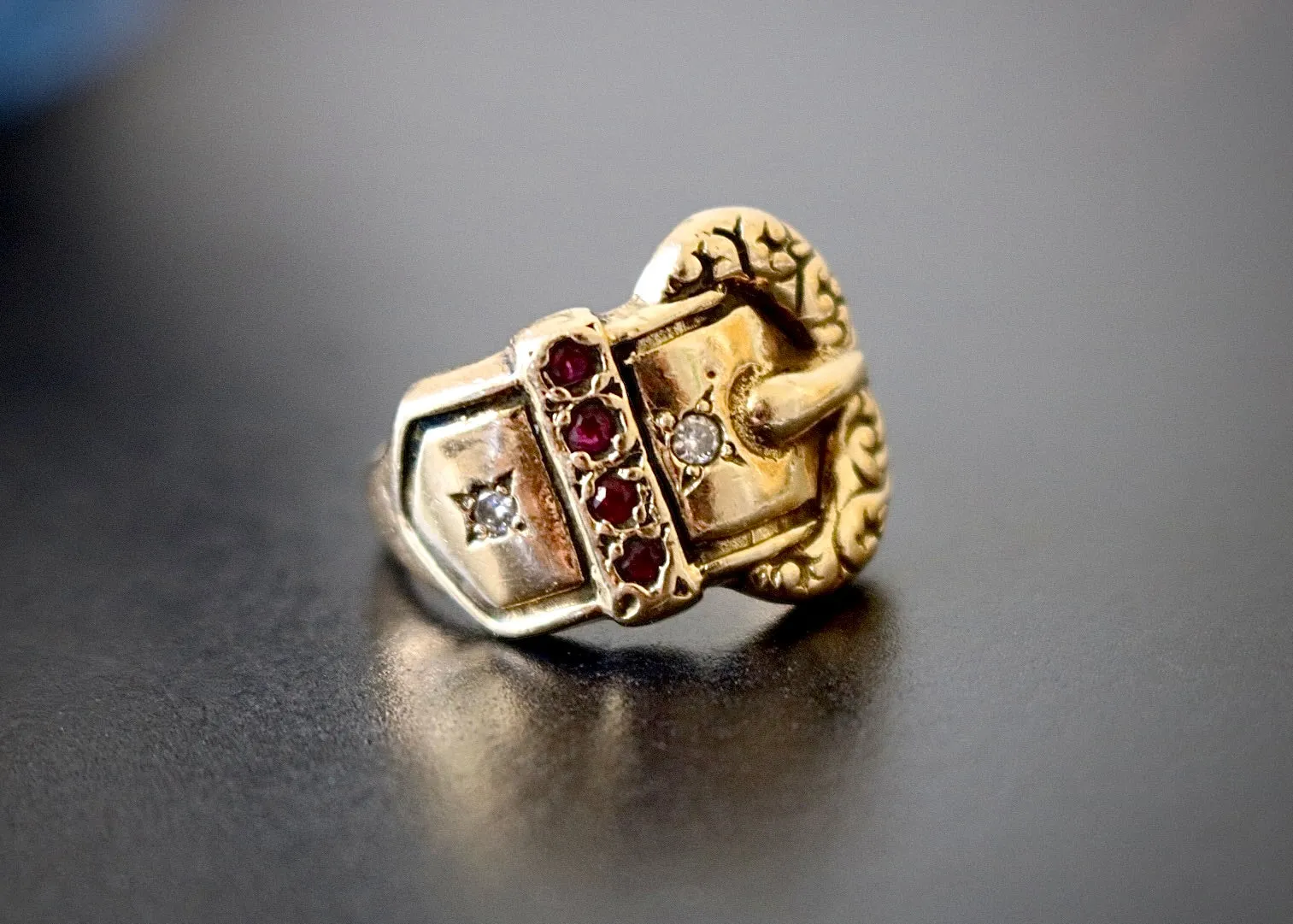 14k Gold Diamond Buckle Ring with Garnets