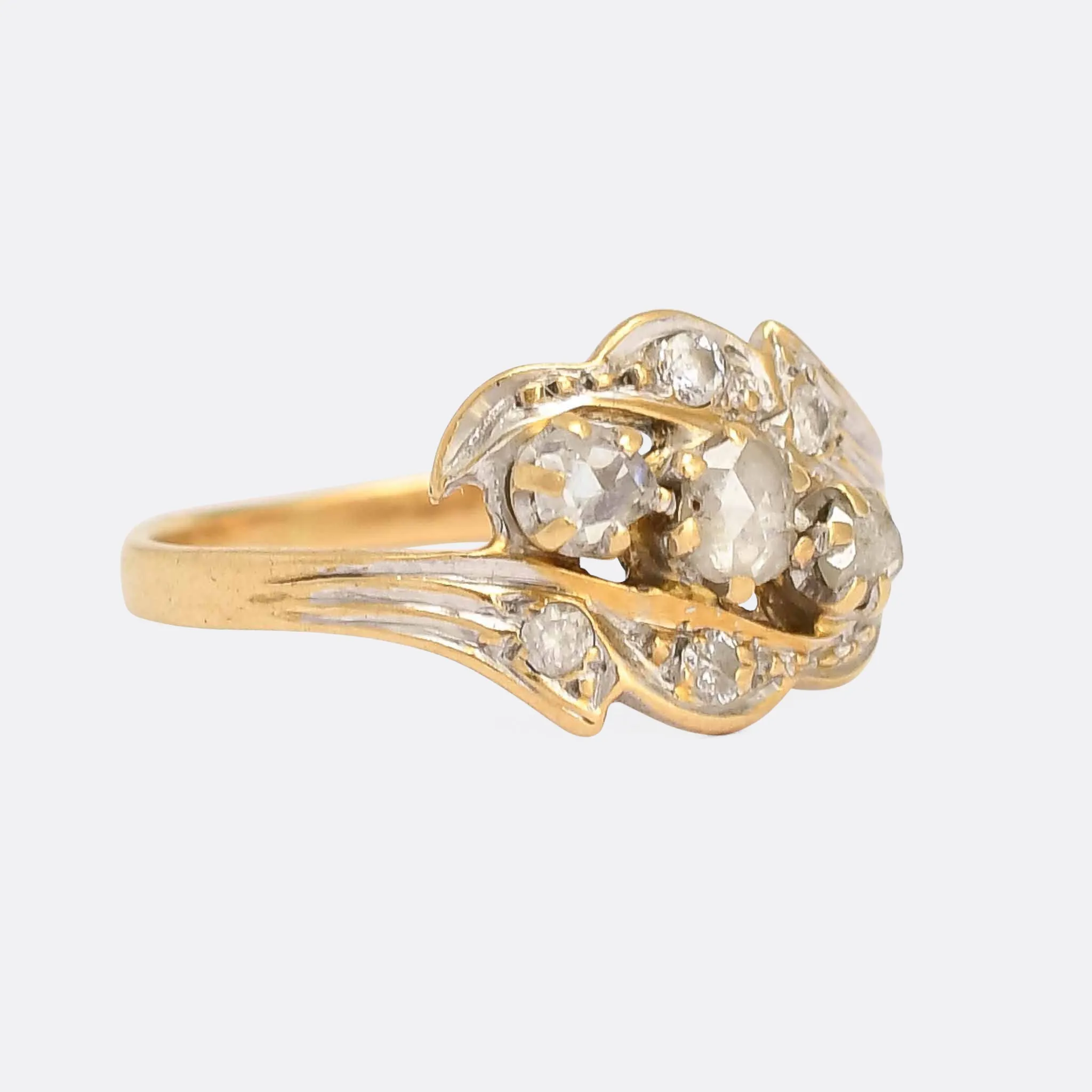 Art Nouveau Three-Stone Diamond Foliate Crossover Ring