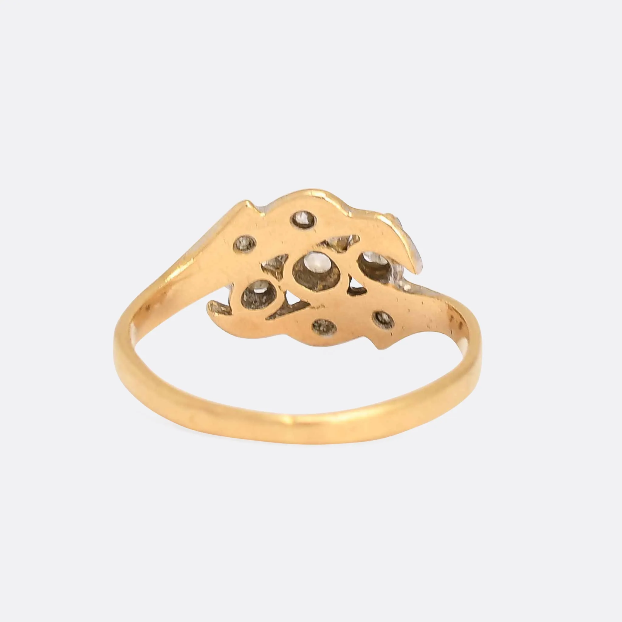 Art Nouveau Three-Stone Diamond Foliate Crossover Ring