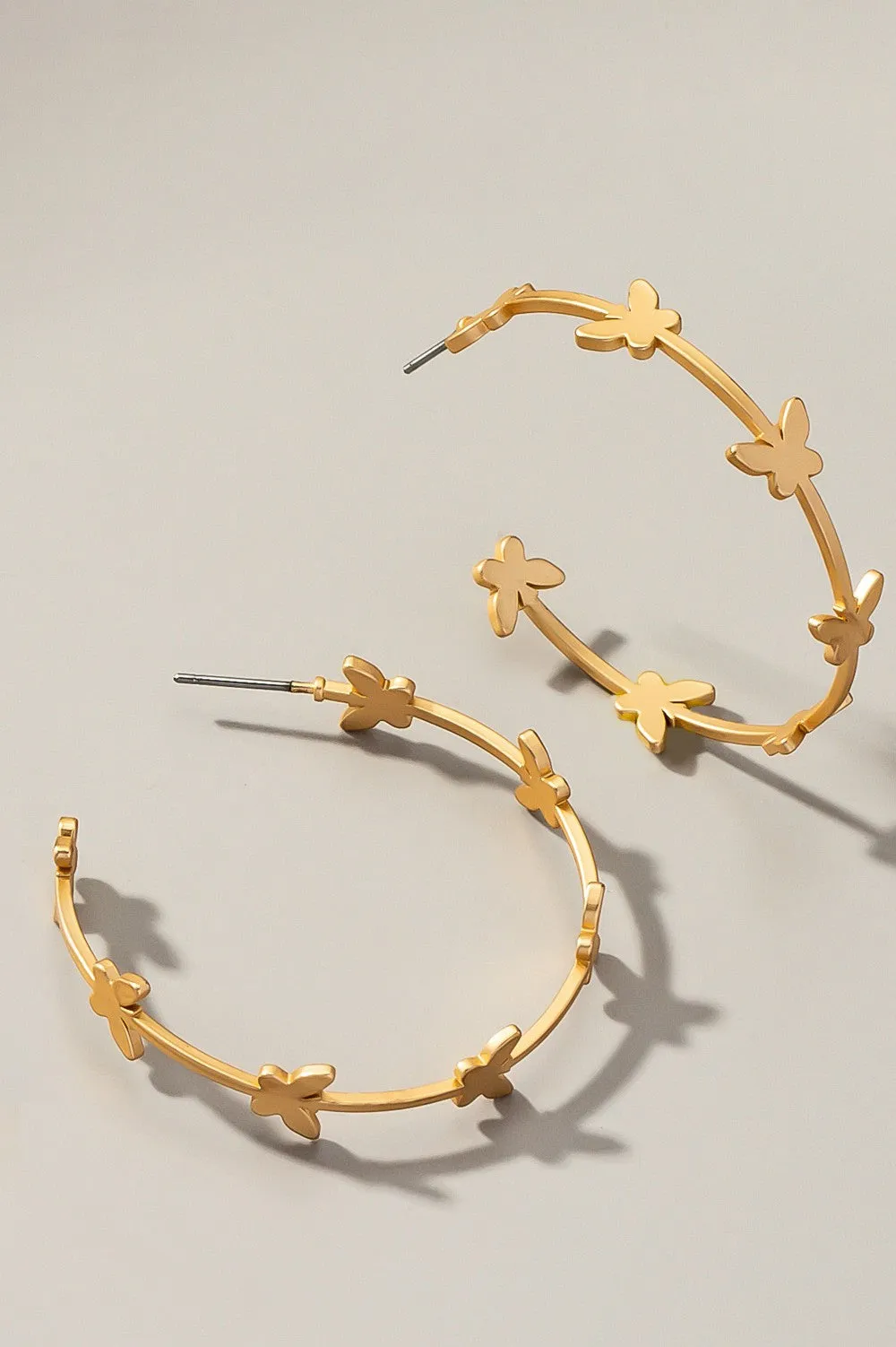 Butterfly stationed hoop earrings