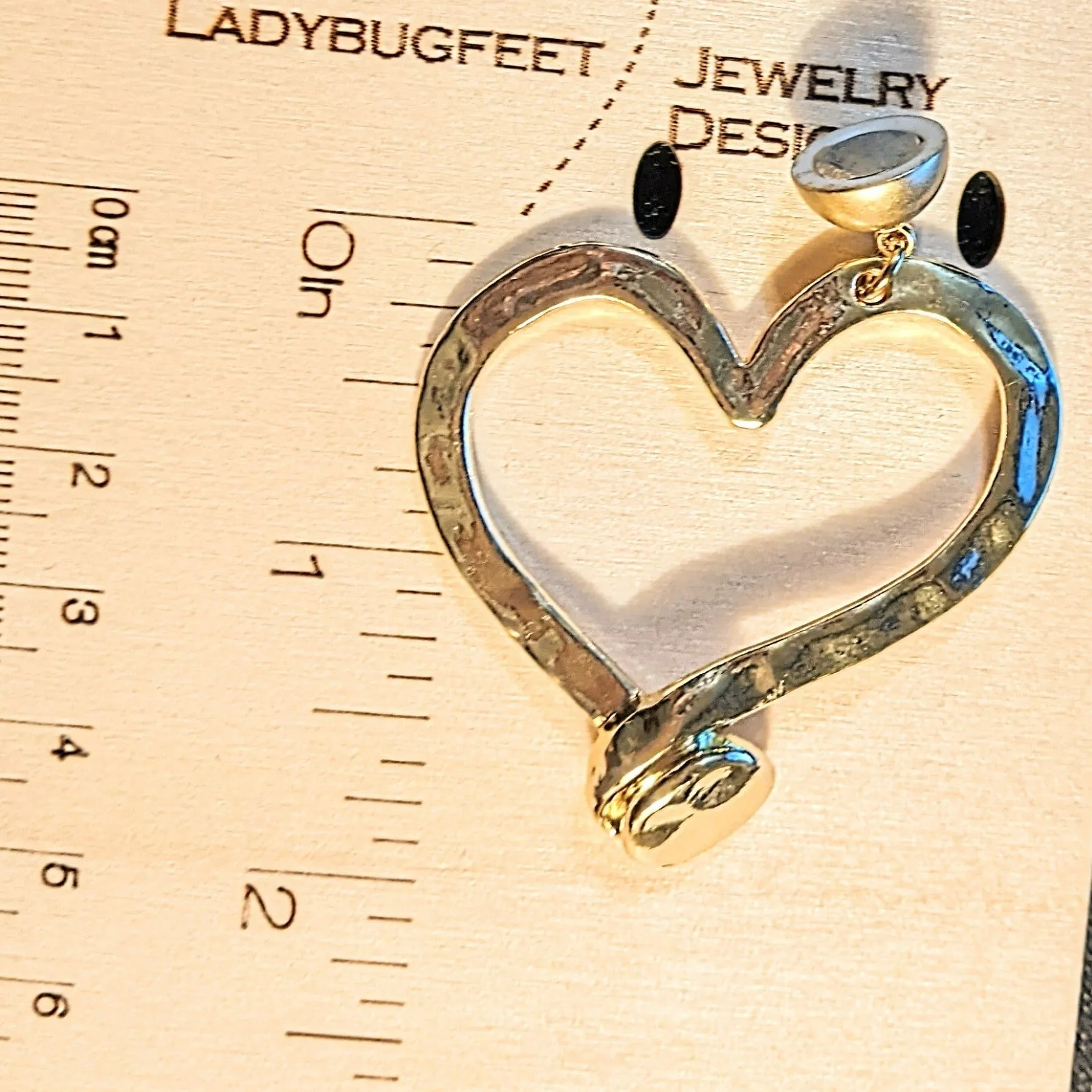 Matte Gold Hammered Heart Nail Pendant