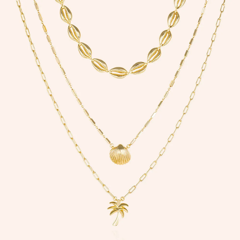 "Copacabana" Set of Three Shells & Palm Pendants Layering Necklaces